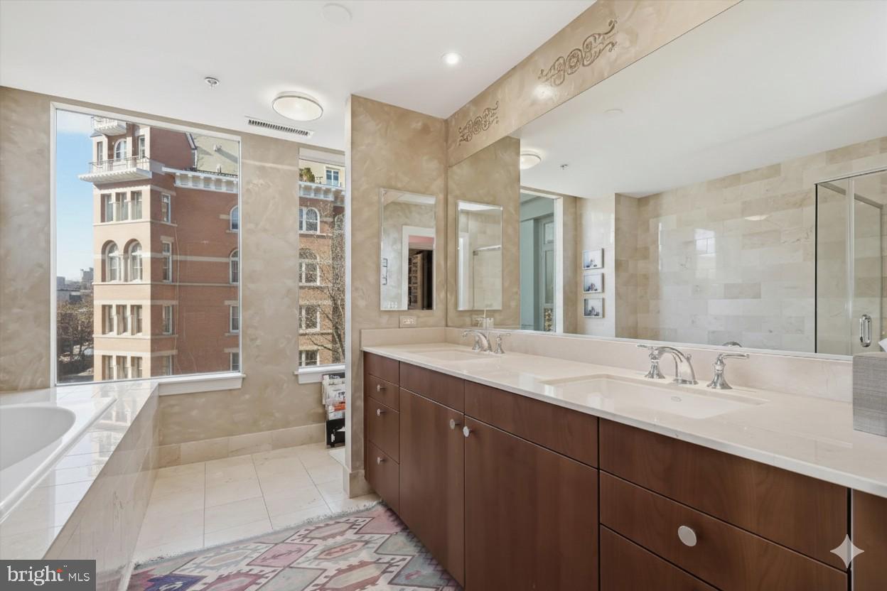 2425 L Street Northwest, Unit 303 Washington, DC 20037 - Photo 19 of 38 En Suite Bath, twin sinks