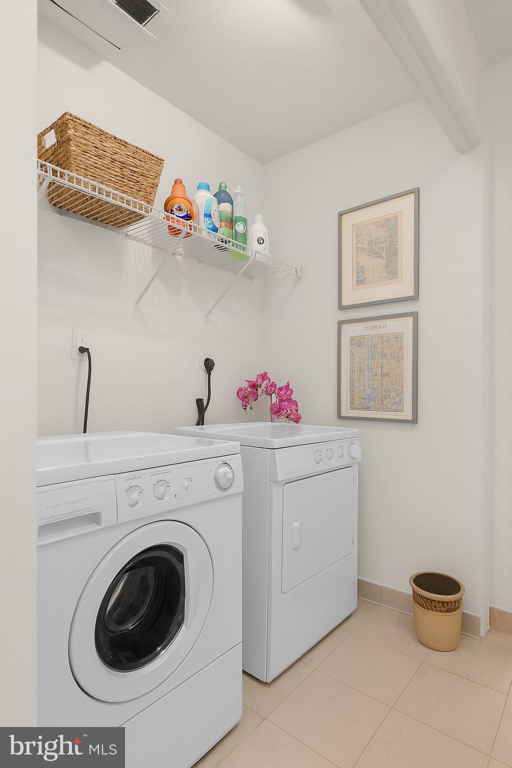 2425 L Street Northwest, Unit 303 Washington, DC 20037 - Photo 27 of 38 Laundry Room