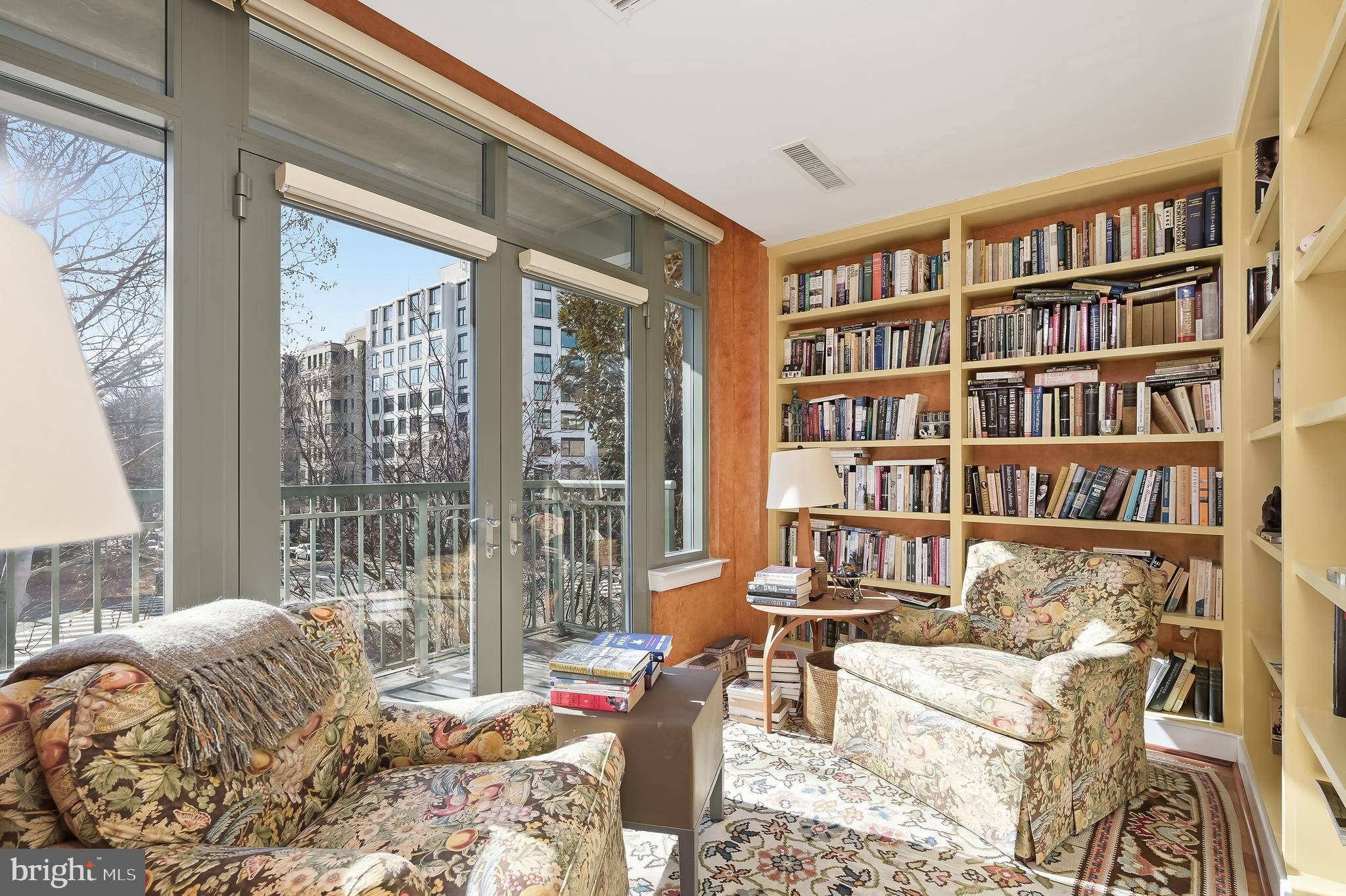2425 L Street Northwest, Unit 303 Washington, DC 20037 - Photo 10 of 38 Den with removable bookcases