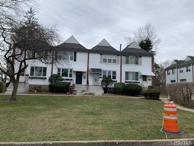 258-16 149th Road Queens, NY 11422 - Photo 2 of 11 a front view of a house with a yard