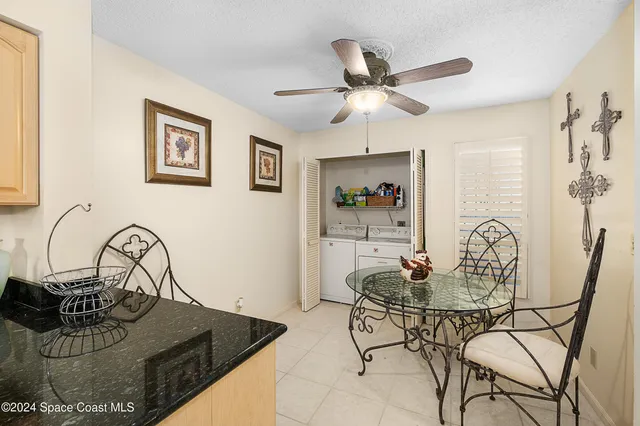 a view of a livingroom with furniture and furniture