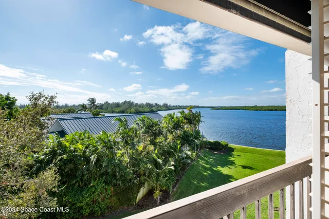 a view of a garden from a balcony