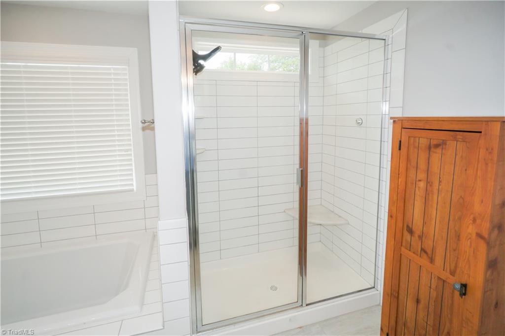 7096 Lambert Lake Road Stokesdale, NC 27357 - Photo 11 of 30 Primary Bathroom