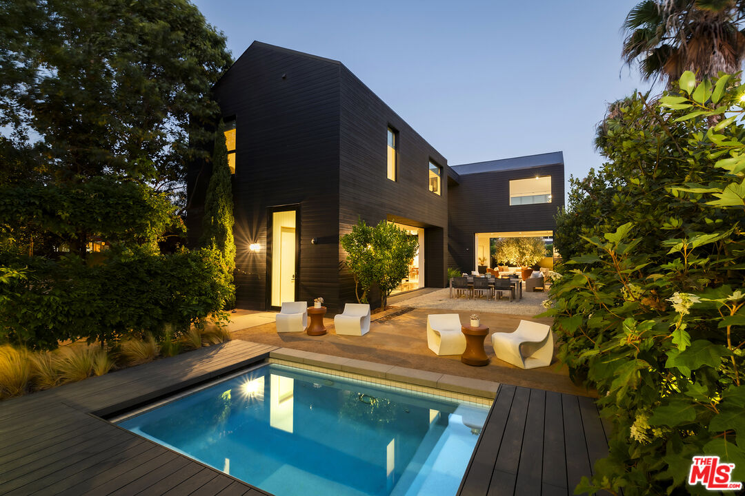 901 Flower Avenue Venice, CA 90291 - Photo 35 of 35 a view of a house with a swimming pool with a patio