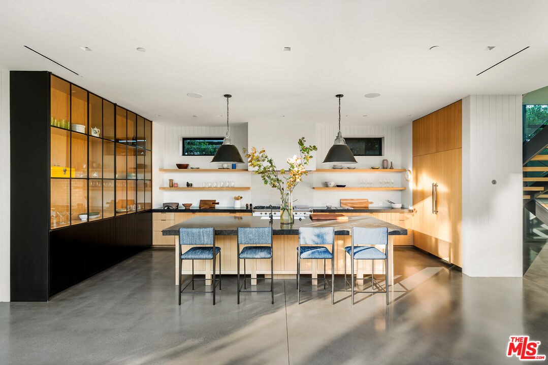 901 Flower Avenue Venice, CA 90291 - Photo 10 of 35 a view of a dining room with furniture window and wooden floor