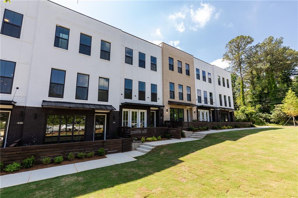 832 Constellation Drive Decatur, GA 30033 - Photo 1 of 1 TPG's Modern Upscale Brick townhome with fenced front courtyard at TOWNS AT NORTH DECATUR.