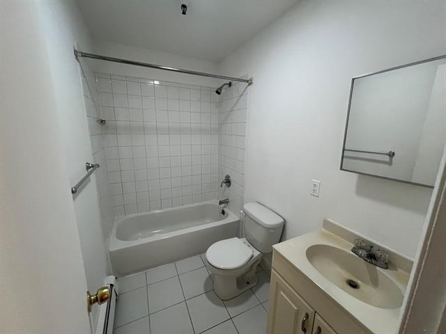 58 Madison Street, Unit 2 Hoboken, NJ 07030 - Photo 19 of 28 a bathroom with a sink toilet and shower