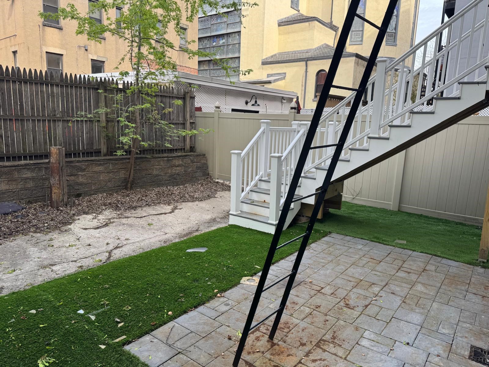 58 Madison Street, Unit 2 Hoboken, NJ 07030 - Photo 21 of 28 a view of an entrance to house with backyard