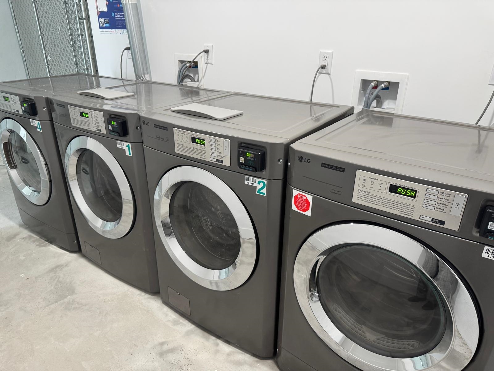 58 Madison Street, Unit 2 Hoboken, NJ 07030 - Photo 23 of 28 a utility room with dryer and washer