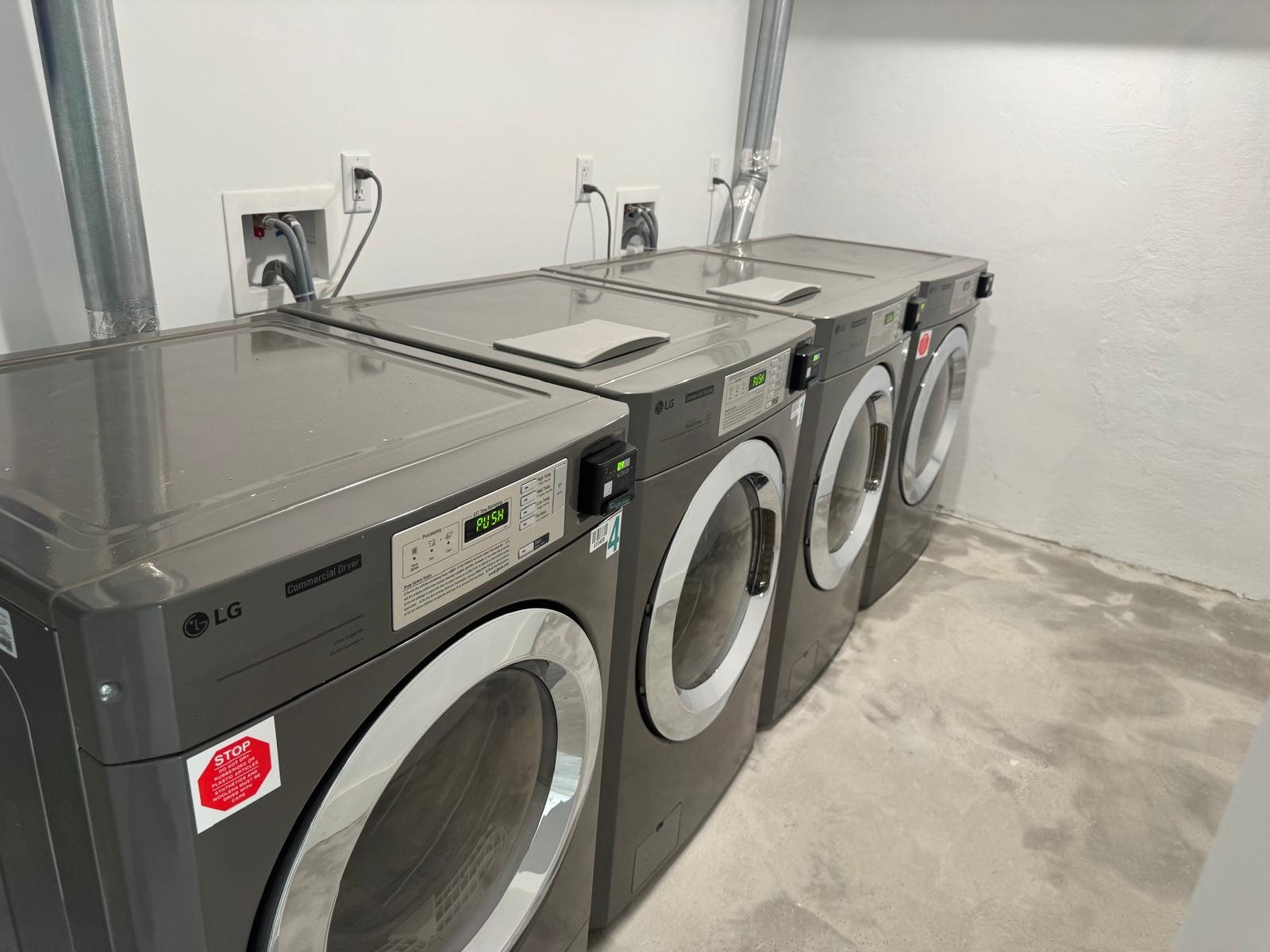 58 Madison Street, Unit 2 Hoboken, NJ 07030 - Photo 24 of 28 a utility room with dryer and washer