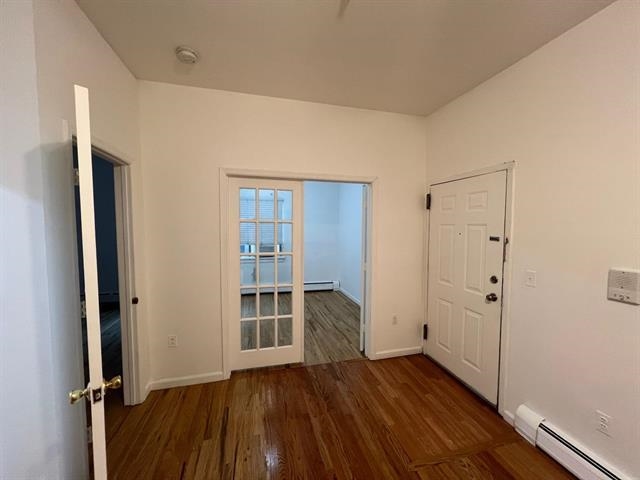 58 Madison Street, Unit 2 Hoboken, NJ 07030 - Photo 10 of 28 wooden floor in an empty room