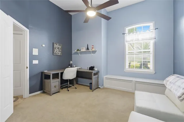 a workspace with furniture and a window