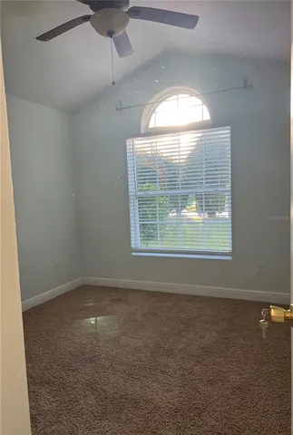 a view of a bathroom with a sink and mirror