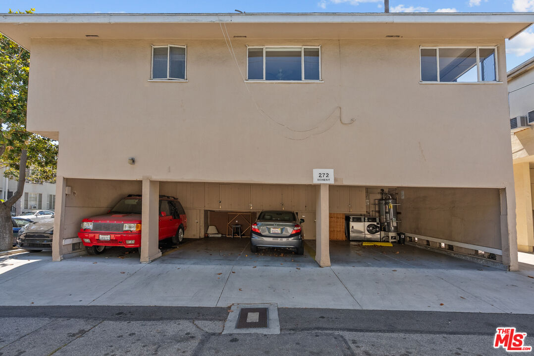 272 South Doheny Drive, Unit 1 Beverly Hills, CA 90211 - Photo 38 of 44 a car parked in front of a building