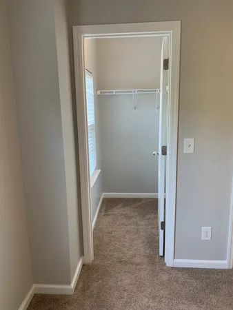 a view of a house with a rug