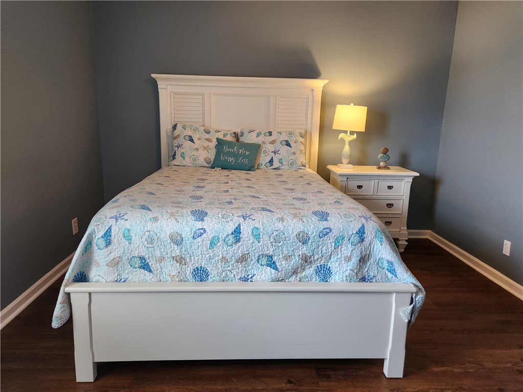 102 South Island Square Drive, Unit 102 St. Simons Island, GA 31522 - Photo 15 of 20 Primary bedroom