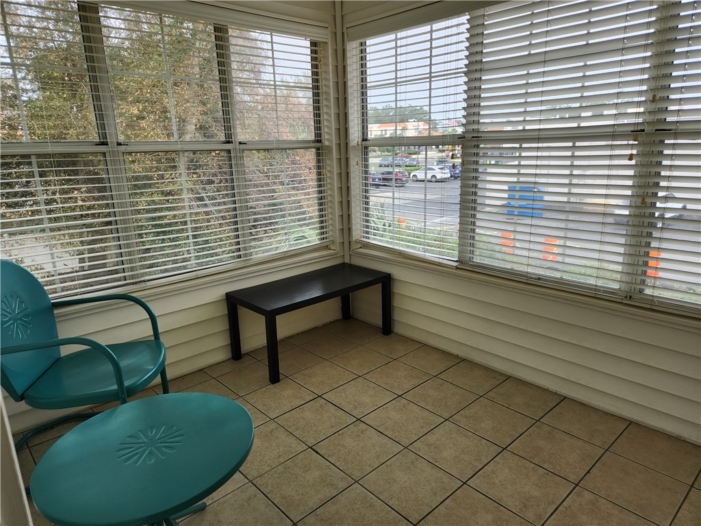 102 South Island Square Drive, Unit 102 St. Simons Island, GA 31522 - Photo 20 of 20 Sun room