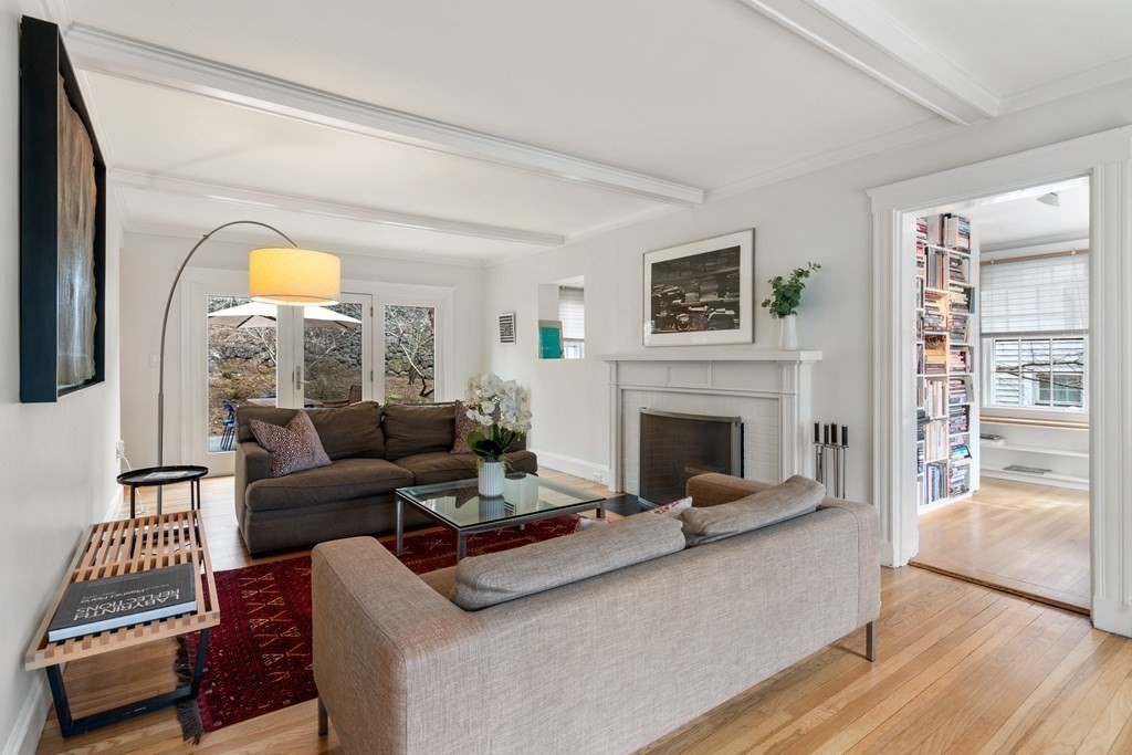 85 Stanton Road Brookline, MA 02445 - Photo 12 of 38 a living room with furniture and a fireplace