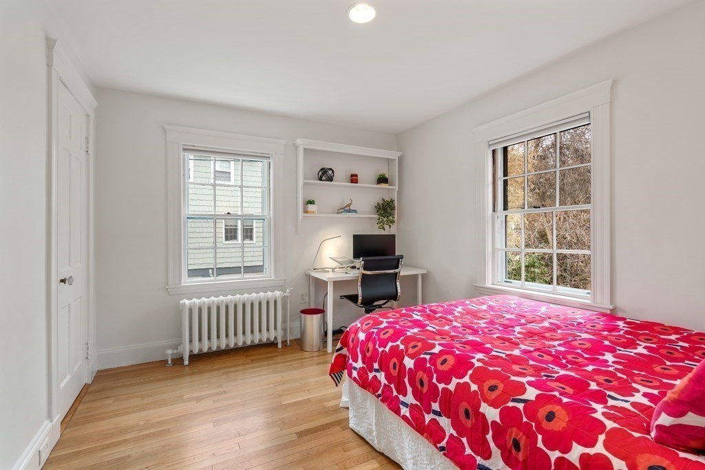 85 Stanton Road Brookline, MA 02445 - Photo 19 of 38 a bedroom with a bed and a window with outer view