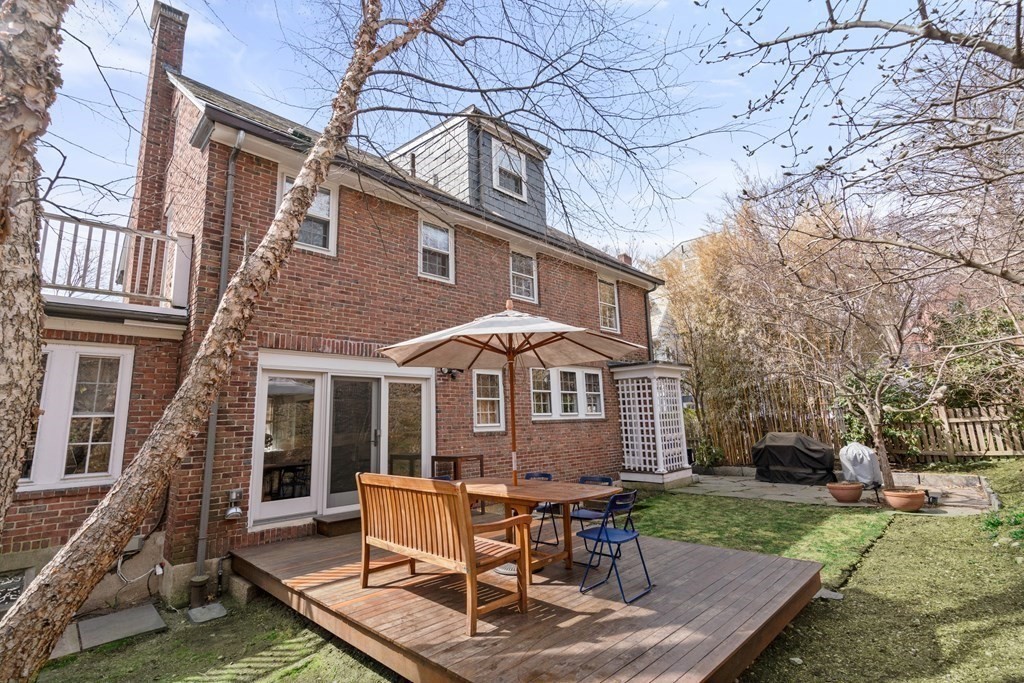 85 Stanton Road Brookline, MA 02445 - Photo 29 of 38 a view of a house with backyard porch and sitting area