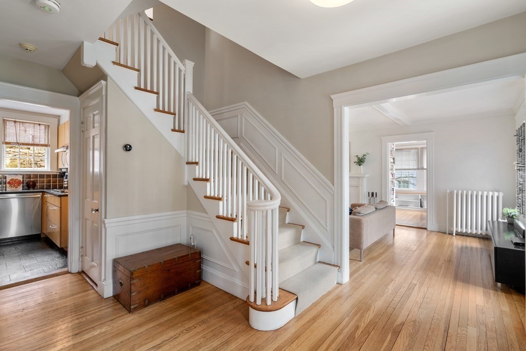 85 Stanton Road Brookline, MA 02445 - Photo 3 of 38 a view of entryway and hall with wooden floor