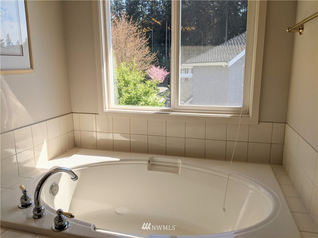 3016 214th Street Southeast Bothell, WA 98021 - Photo 11 of 25 a bathroom with a bathtub