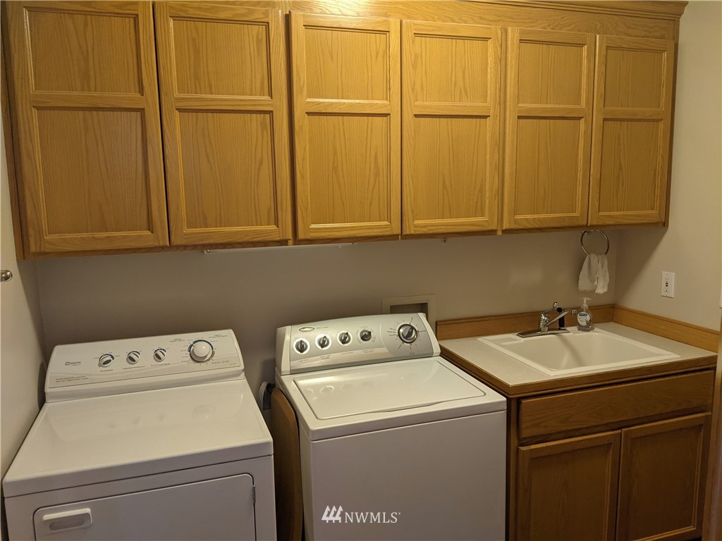 3016 214th Street Southeast Bothell, WA 98021 - Photo 17 of 25 a utility room with dryer and washer