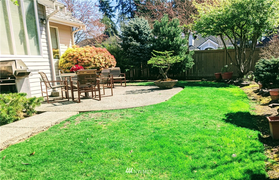 3016 214th Street Southeast Bothell, WA 98021 - Photo 21 of 25 a view of a house with backyard and sitting area