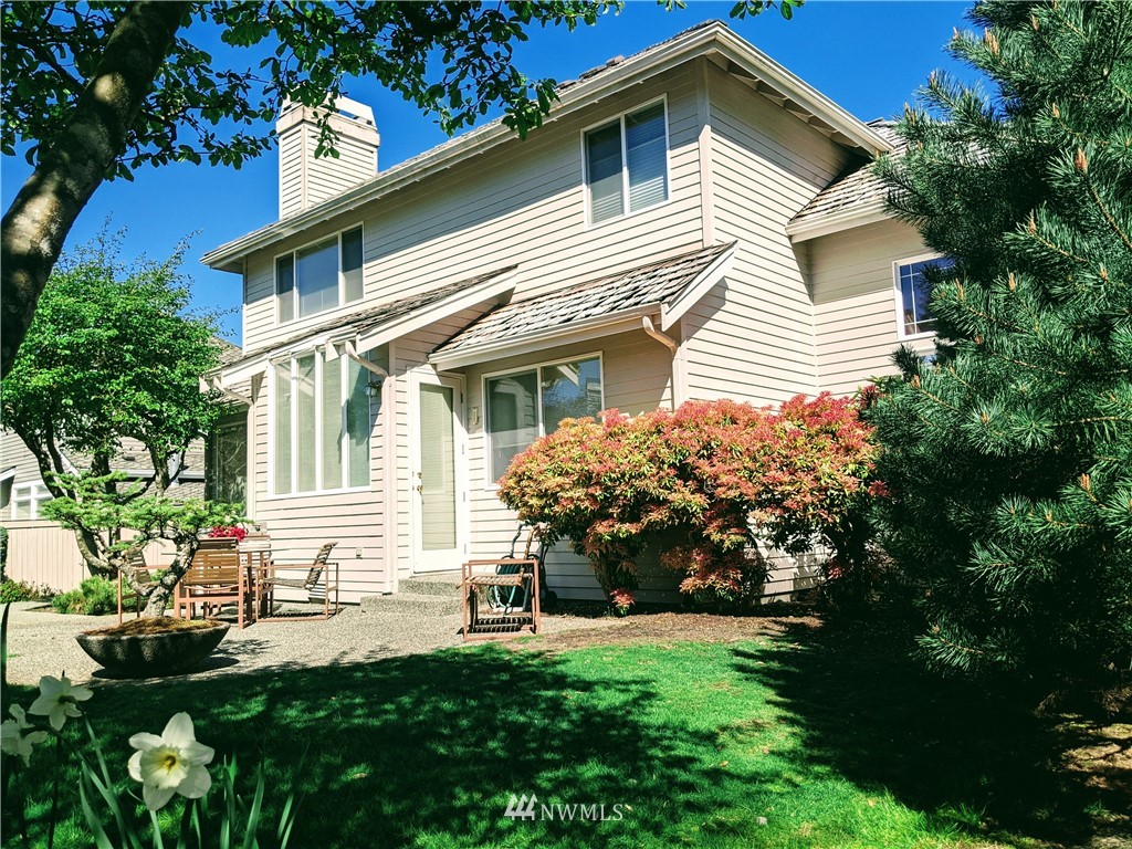 3016 214th Street Southeast Bothell, WA 98021 - Photo 22 of 25 a front view of a house with a yard