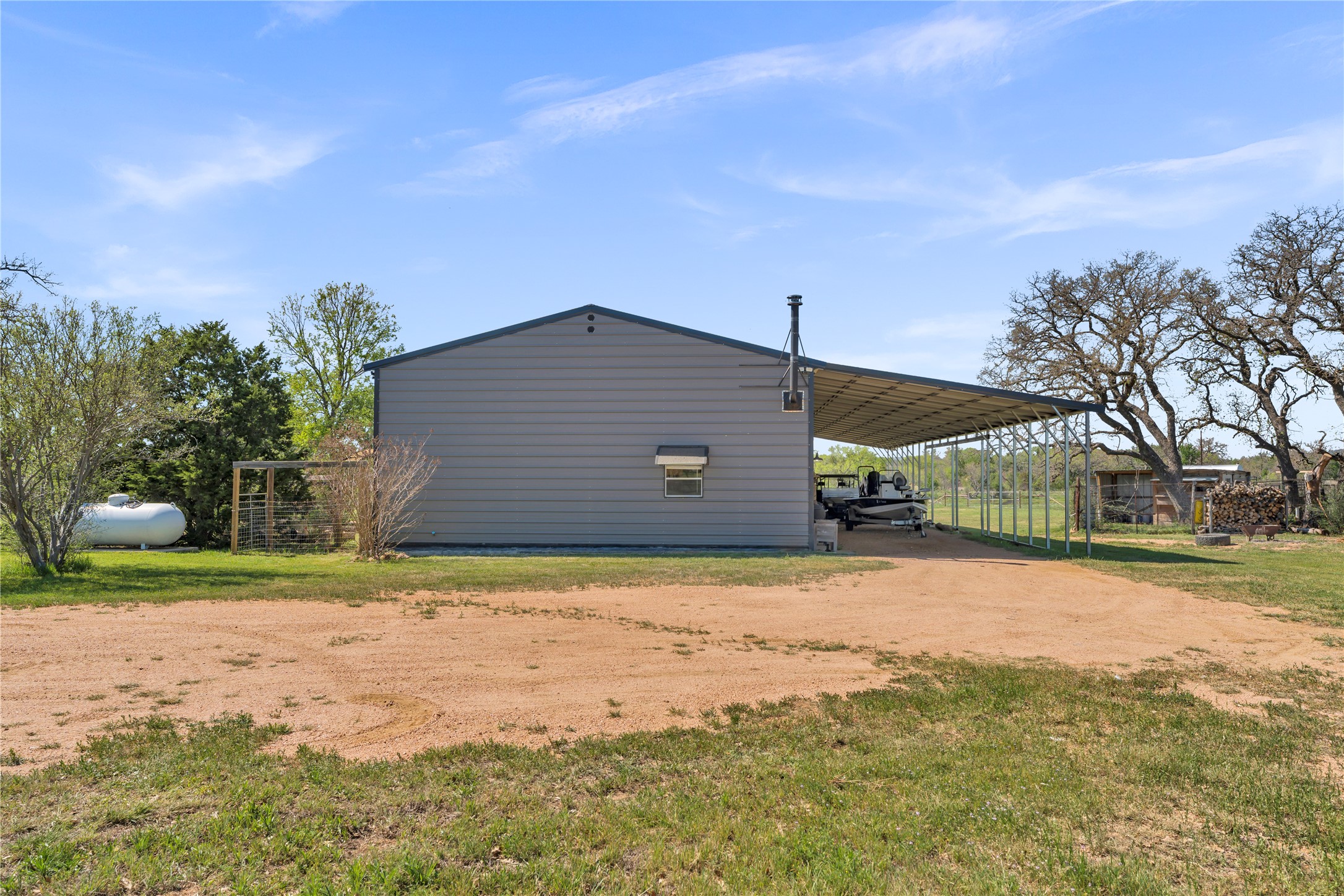 6475 County Road 216 Bluffton, TX 78607 - Photo 14 of 33 a backyard of a house