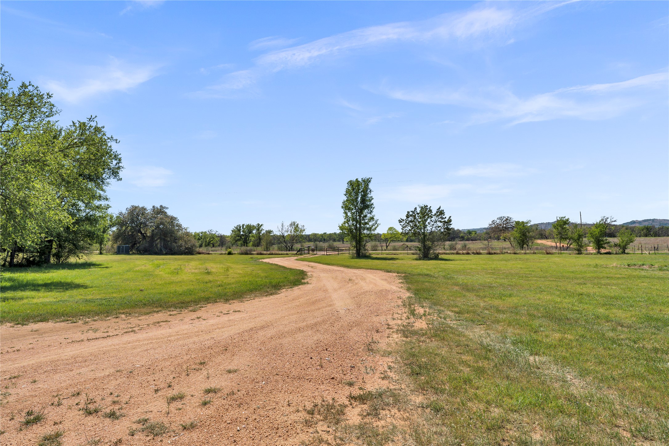 6475 County Road 216 Bluffton, TX 78607 - Photo 16 of 33 a view of a lake and houses in the back
