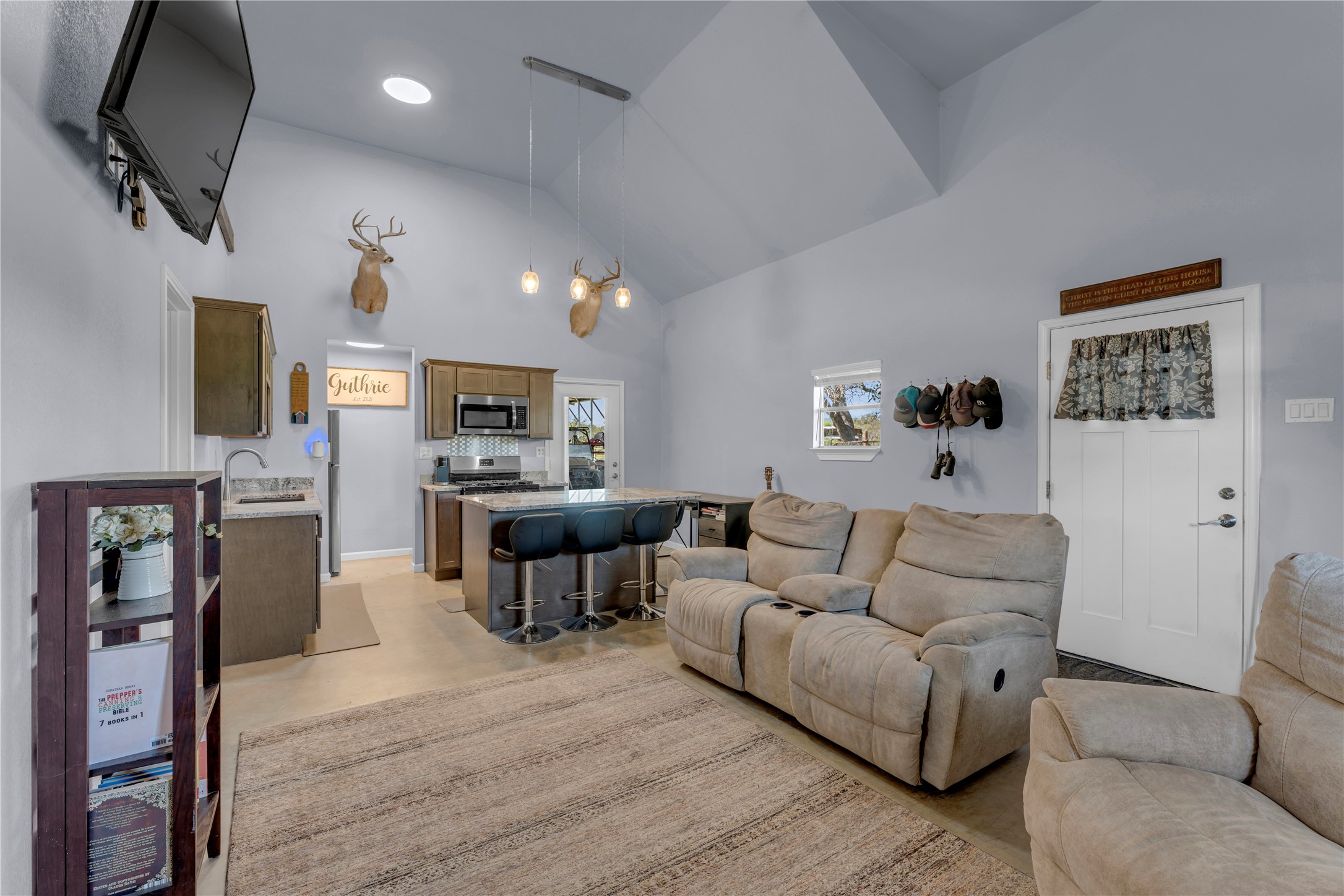 6475 County Road 216 Bluffton, TX 78607 - Photo 22 of 33 a living room with furniture wooden floor and a flat screen tv