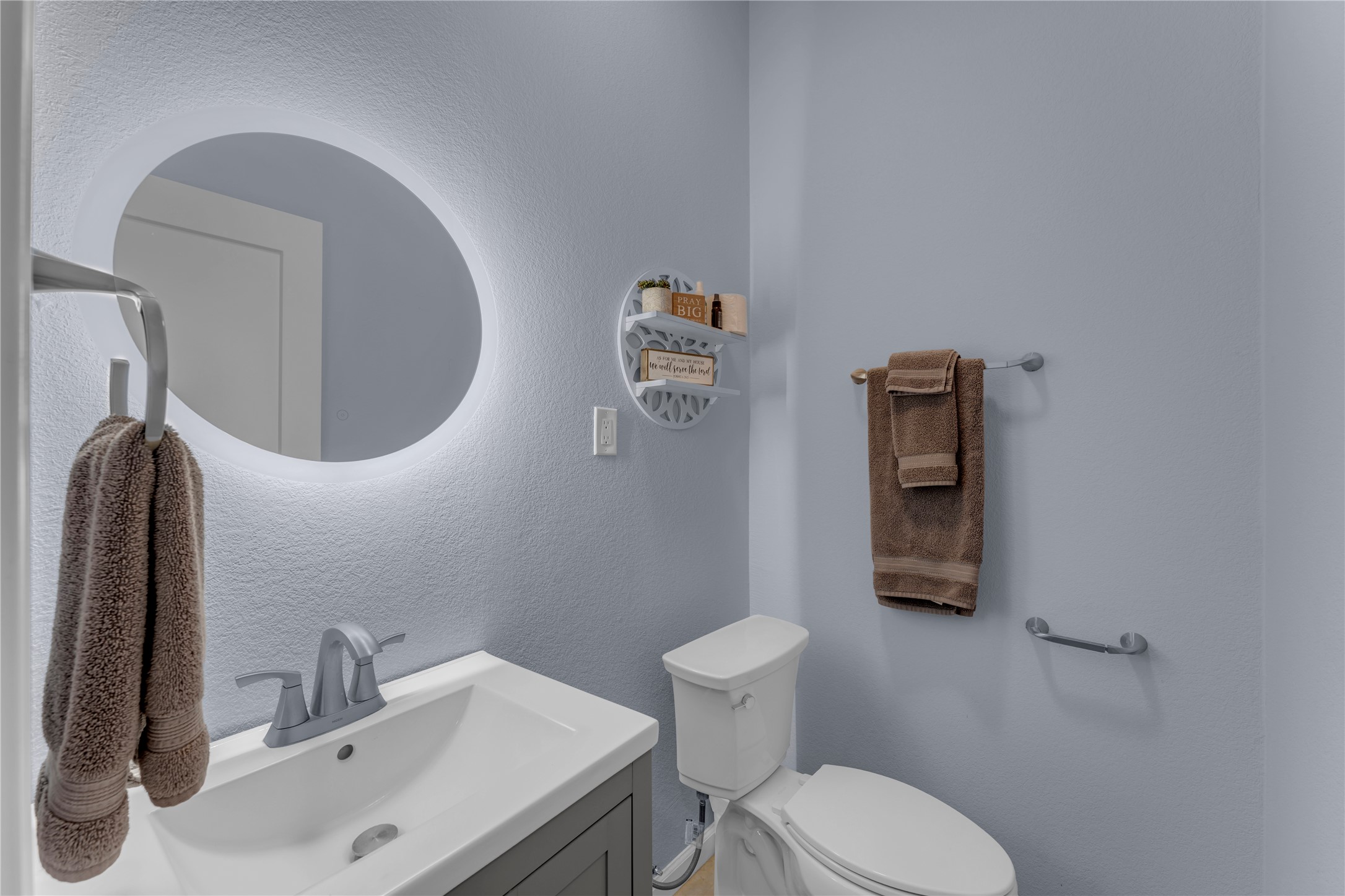 6475 County Road 216 Bluffton, TX 78607 - Photo 30 of 33 a bathroom with a toilet sink and mirror