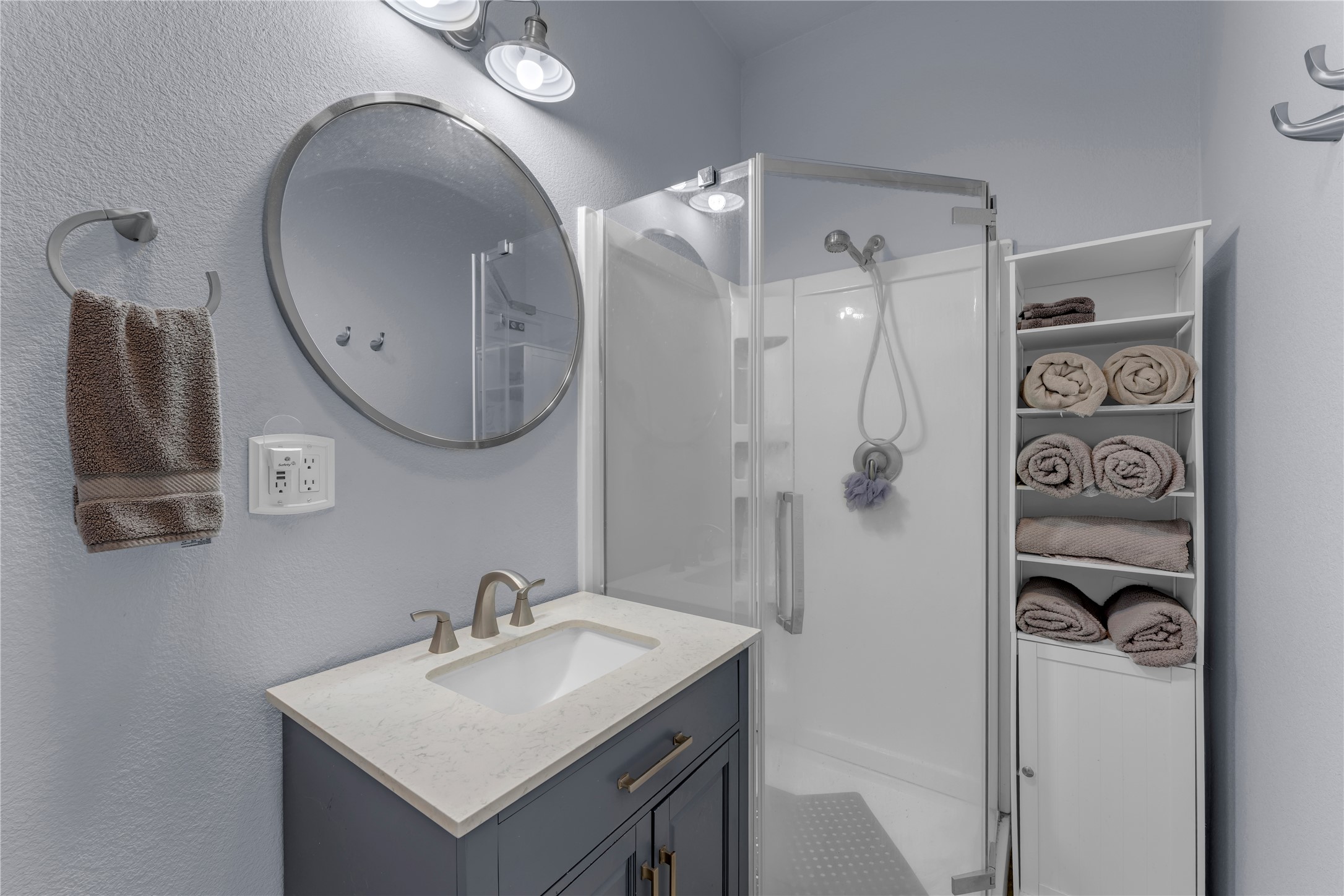 6475 County Road 216 Bluffton, TX 78607 - Photo 31 of 33 a bathroom with a sink vanity and a mirror