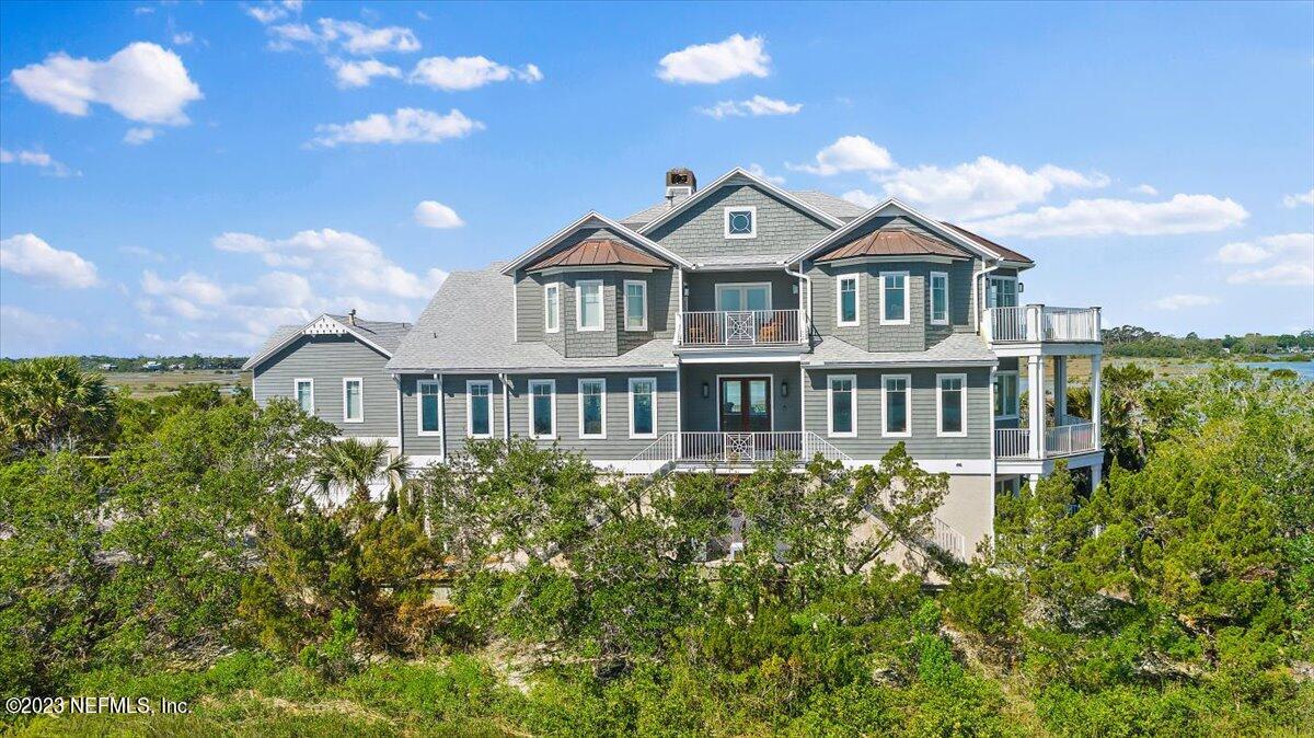 3425 Lands End Drive St. Augustine, FL 32084 - Photo 1 of 79 a front view of a house with a yard