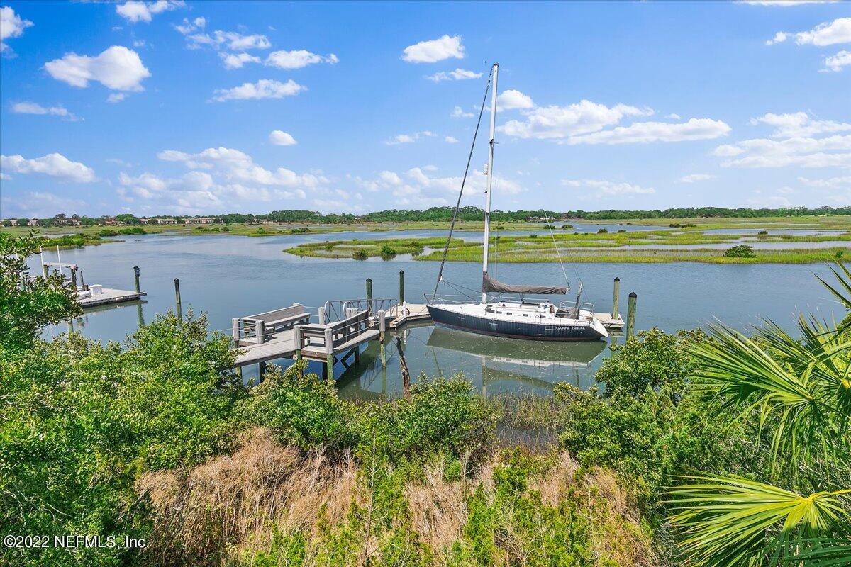 3425 Lands End Drive St. Augustine, FL 32084 - Photo 13 of 79 a view of a lake with a building in the background