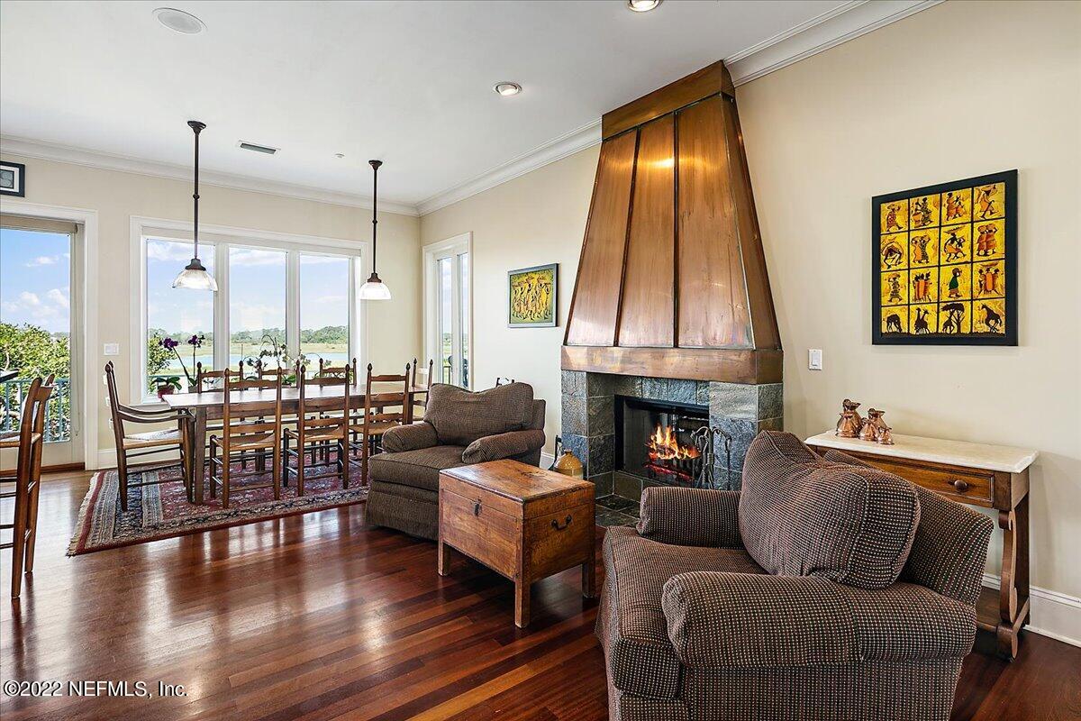 3425 Lands End Drive St. Augustine, FL 32084 - Photo 20 of 79 a living room with furniture fireplace and window