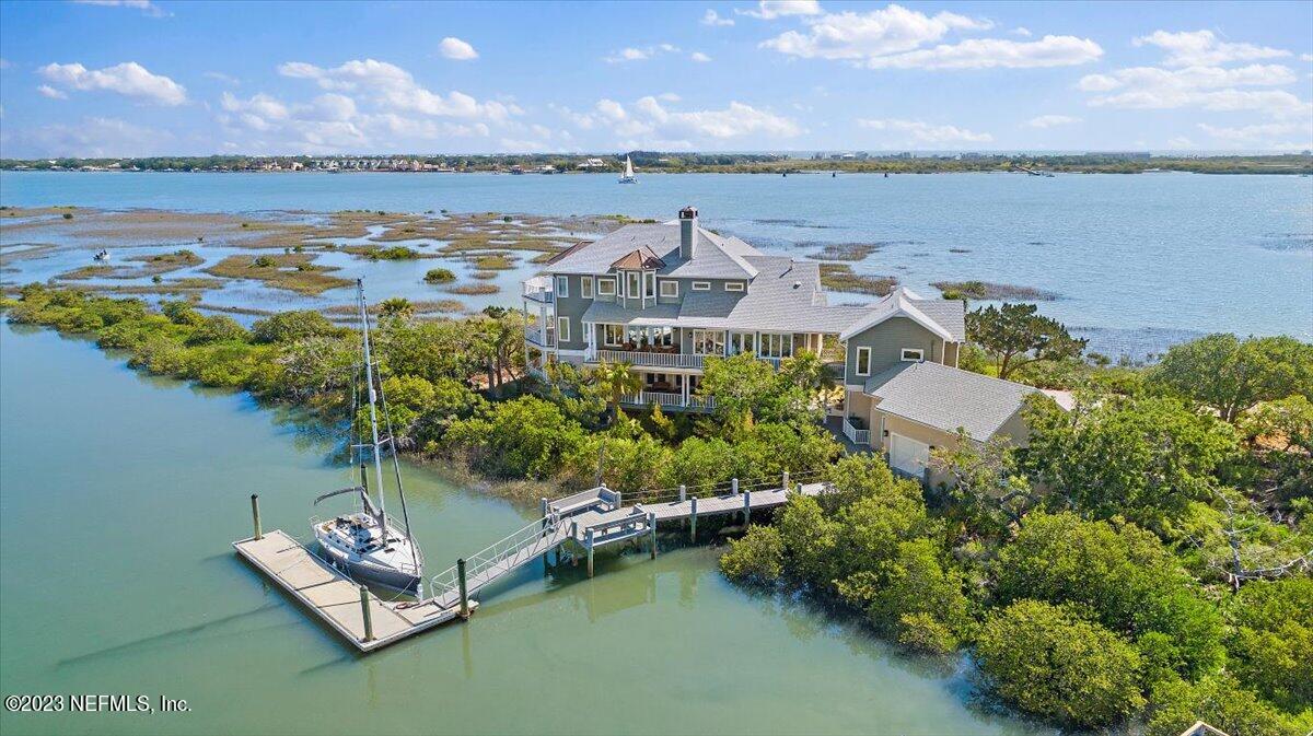 3425 Lands End Drive St. Augustine, FL 32084 - Photo 2 of 79 a view of a lake with houses in the back