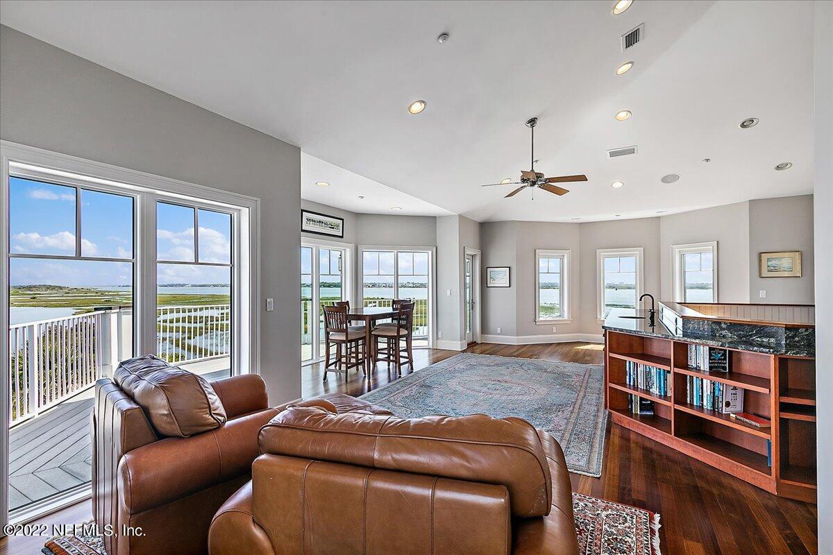 3425 Lands End Drive St. Augustine, FL 32084 - Photo 33 of 79 a living room with furniture and a large window