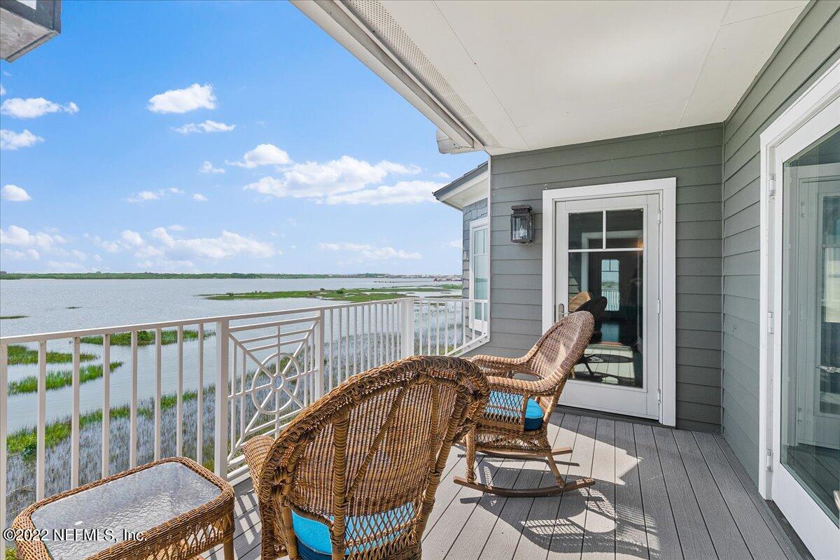 3425 Lands End Drive St. Augustine, FL 32084 - Photo 41 of 79 a view of a balcony with chair and table