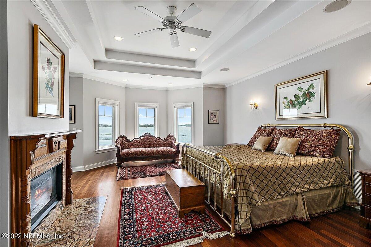 3425 Lands End Drive St. Augustine, FL 32084 - Photo 45 of 79 a bedroom with a bed couch and a window