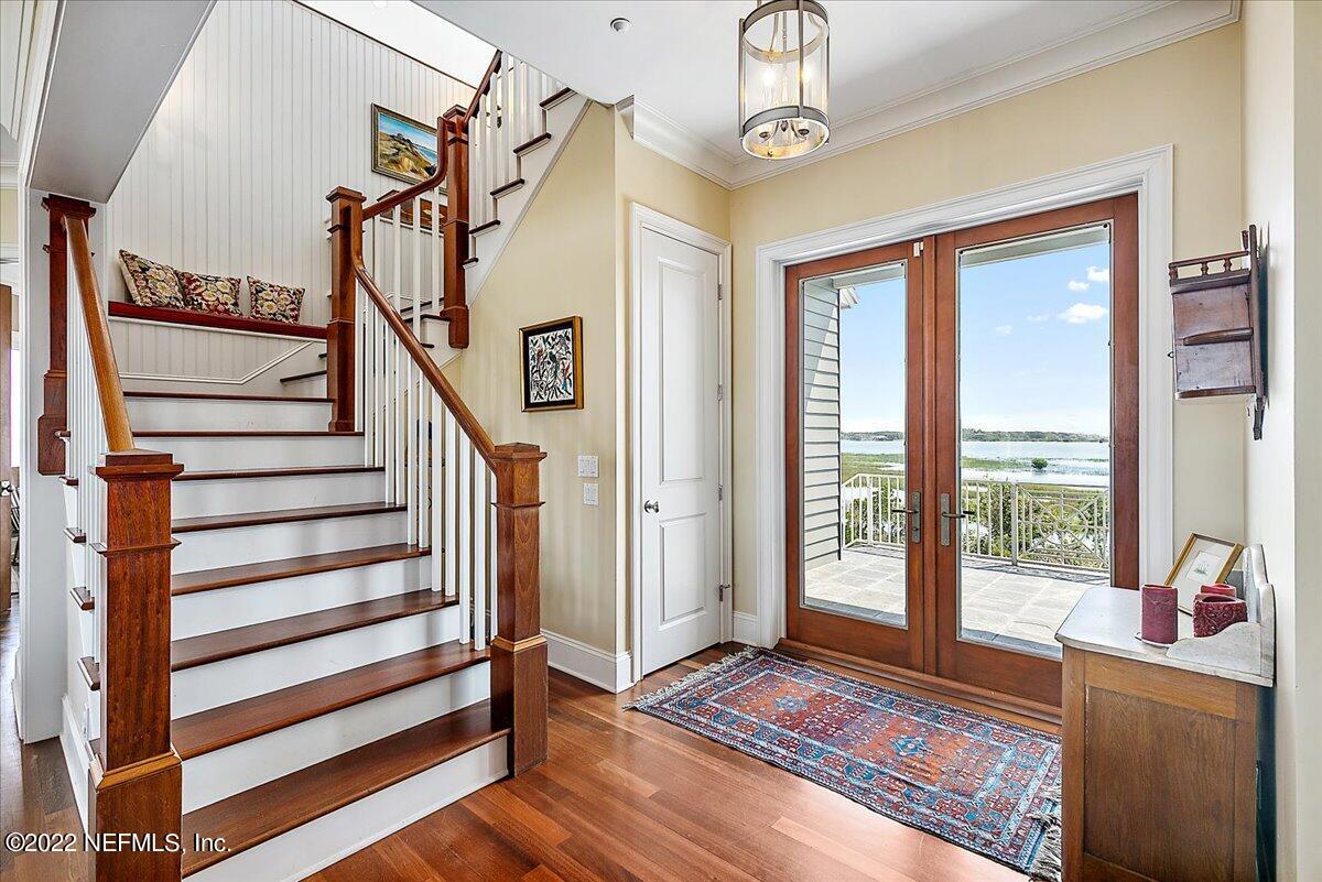 3425 Lands End Drive St. Augustine, FL 32084 - Photo 5 of 79 a view of a hallway with wooden floor and windows