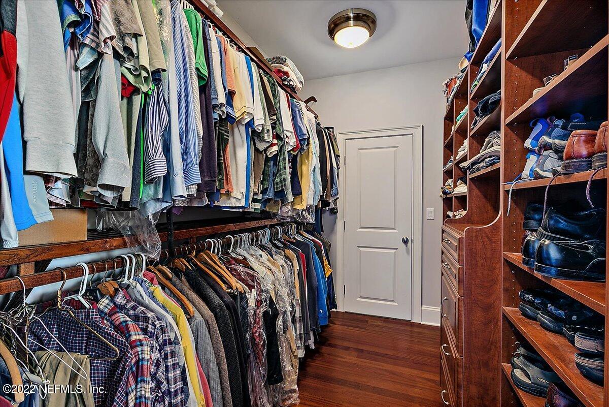 3425 Lands End Drive St. Augustine, FL 32084 - Photo 51 of 79 a view of walk in closet with clothes and shoes