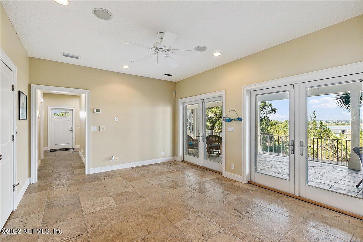 3425 Lands End Drive St. Augustine, FL 32084 - Photo 53 of 79 a view of an empty room with glass door and a shower