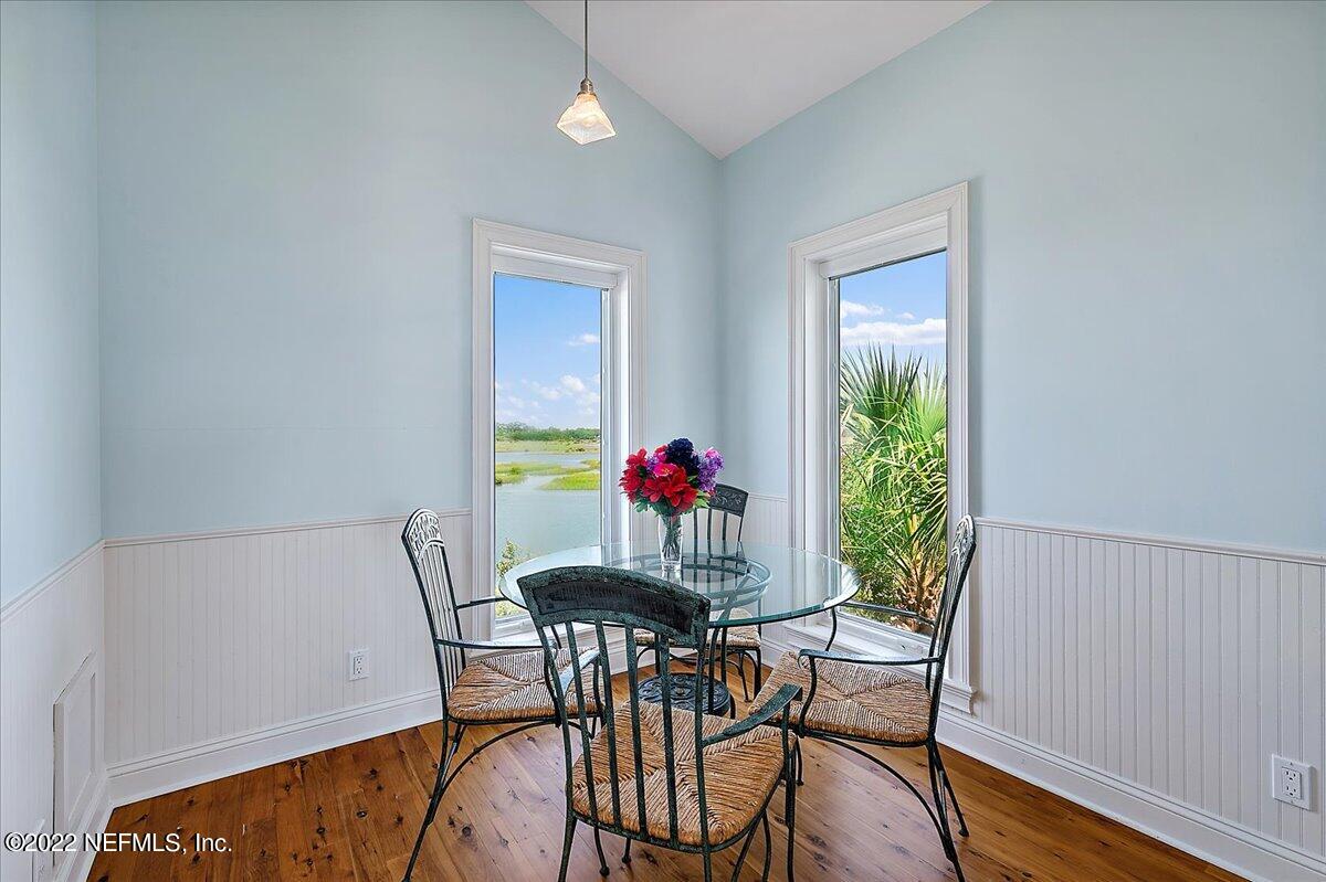 3425 Lands End Drive St. Augustine, FL 32084 - Photo 69 of 79 a view of a dining room with furniture and wooden floor