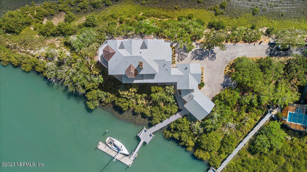 3425 Lands End Drive St. Augustine, FL 32084 - Photo 74 of 79 an aerial view of a house with outdoor space and a lake view