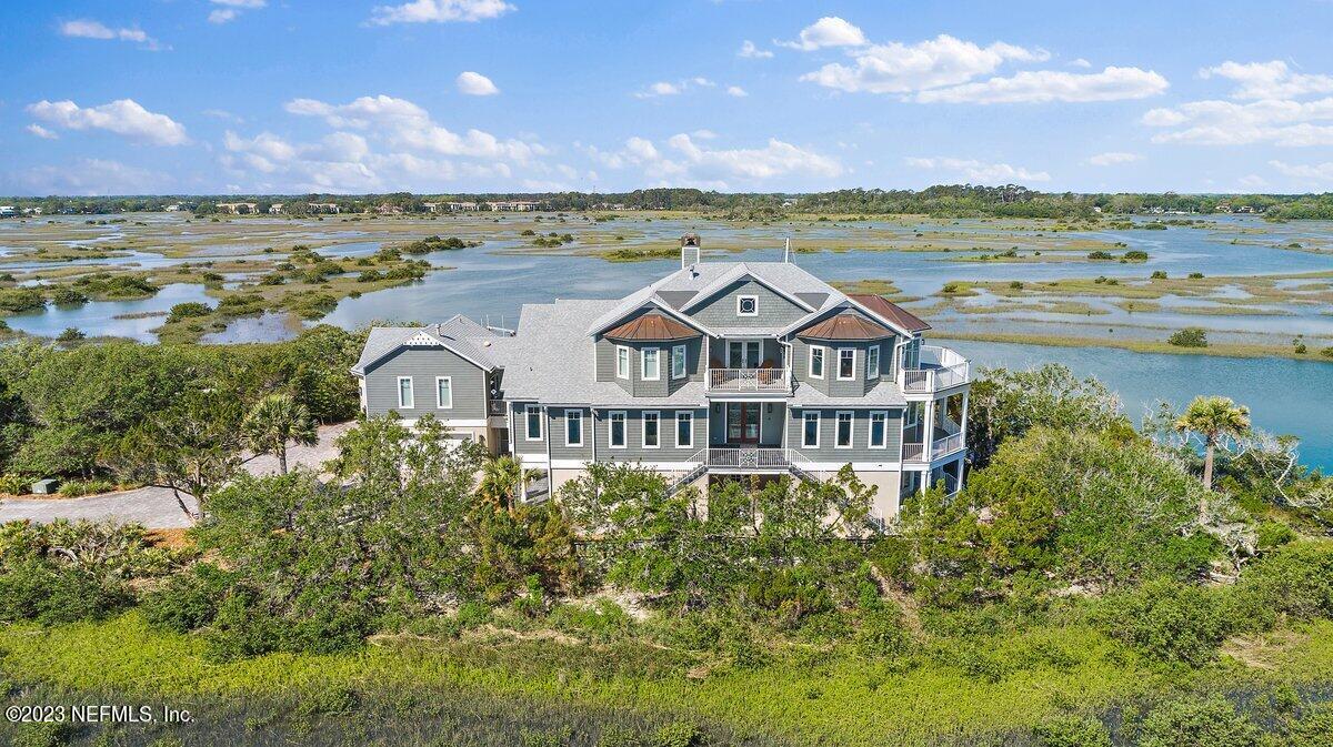 3425 Lands End Drive St. Augustine, FL 32084 - Photo 76 of 79 a view of a lake with a mountain in the background