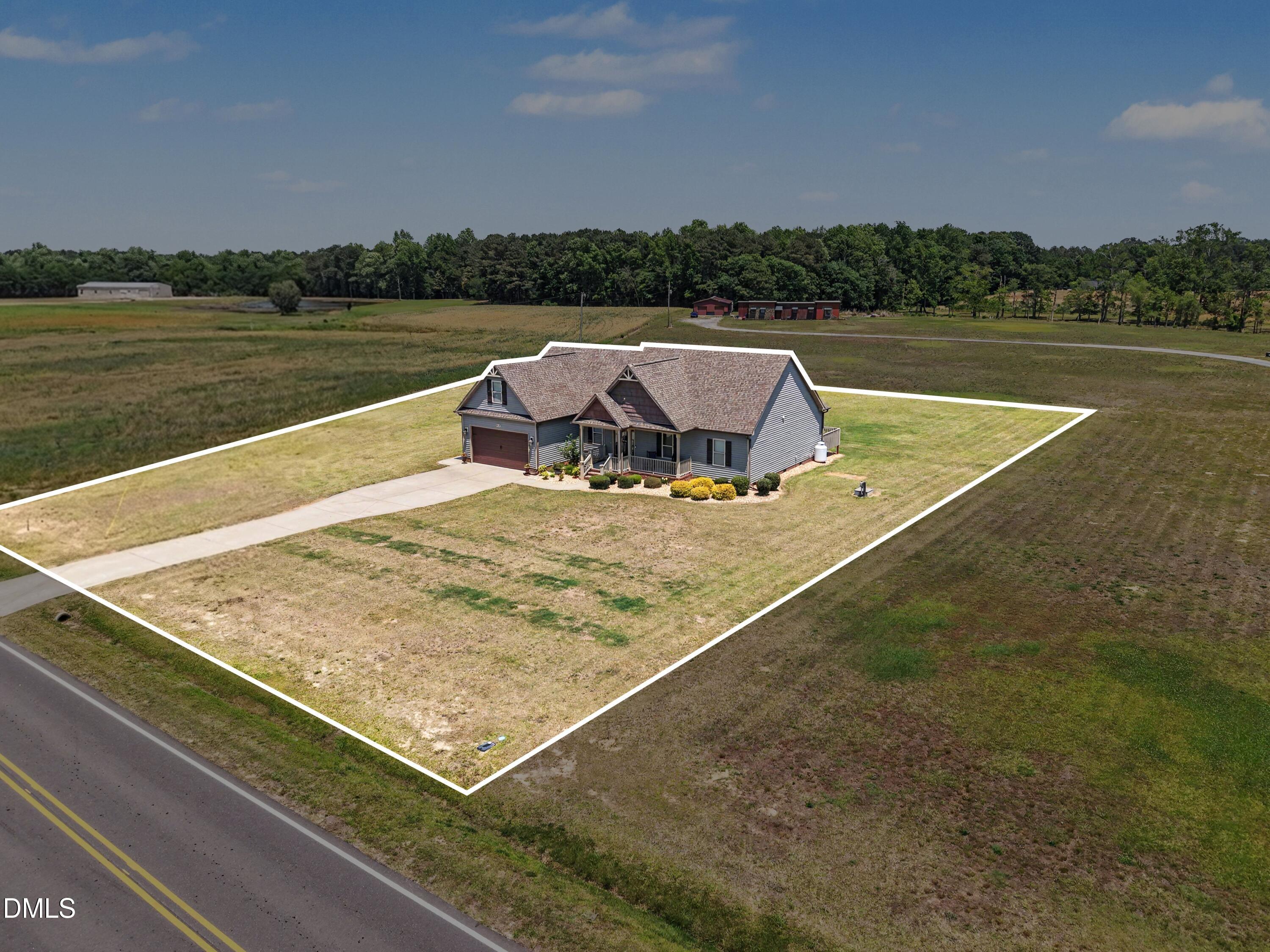 3587 Hannah Creek Road Benson, NC 27504 - Photo 43 of 43 a view of a pool with a lake view