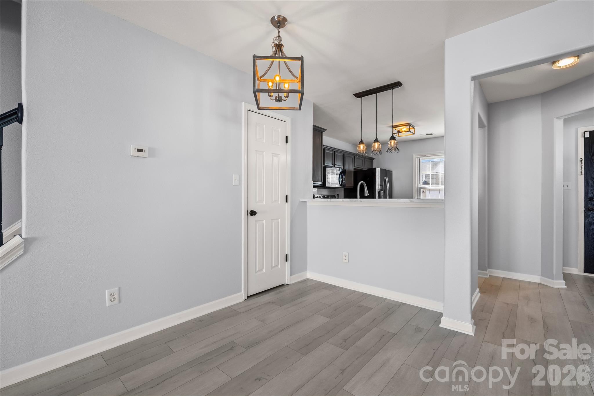 4485 Easywater Lane Fort Mill, SC 29707 - Photo 13 of 29 a view of a kitchen cabinets and wooden floor