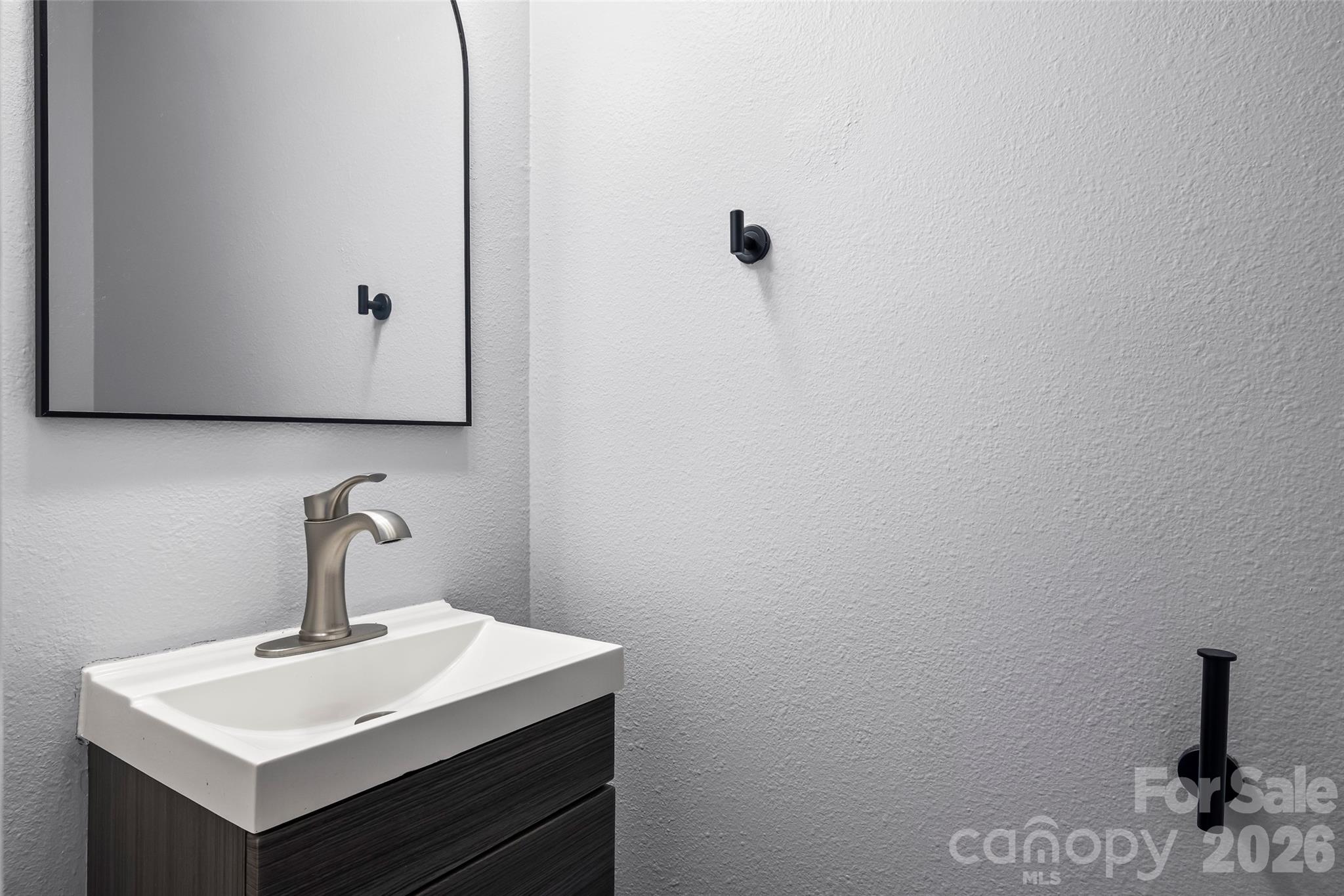 4485 Easywater Lane Fort Mill, SC 29707 - Photo 14 of 29 a bathroom with a sink and mirror